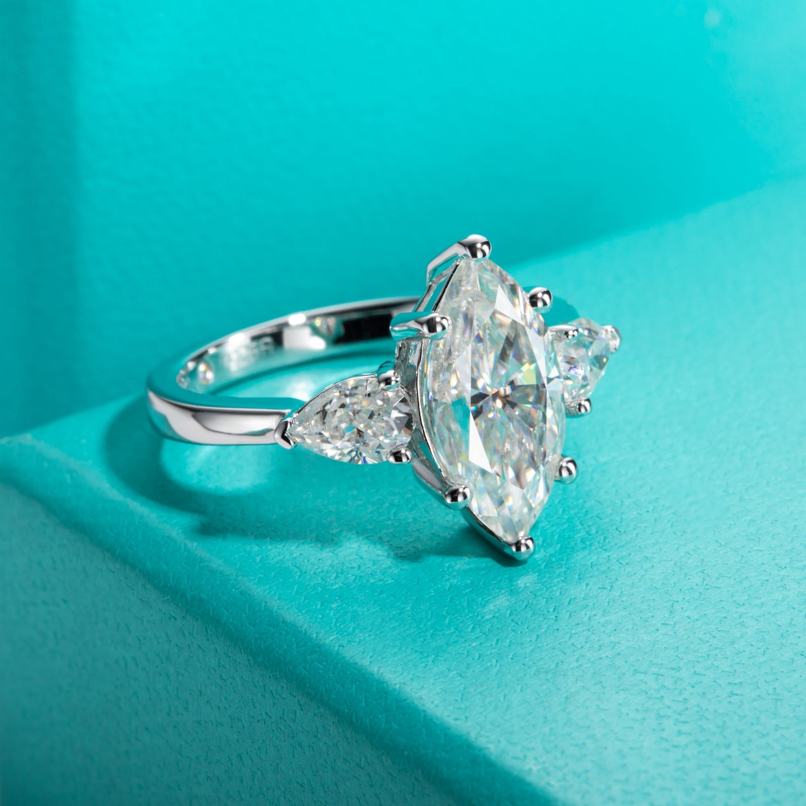 Marquise Cut 3 Stone Moissanite Engagement Ring (4 cttw)