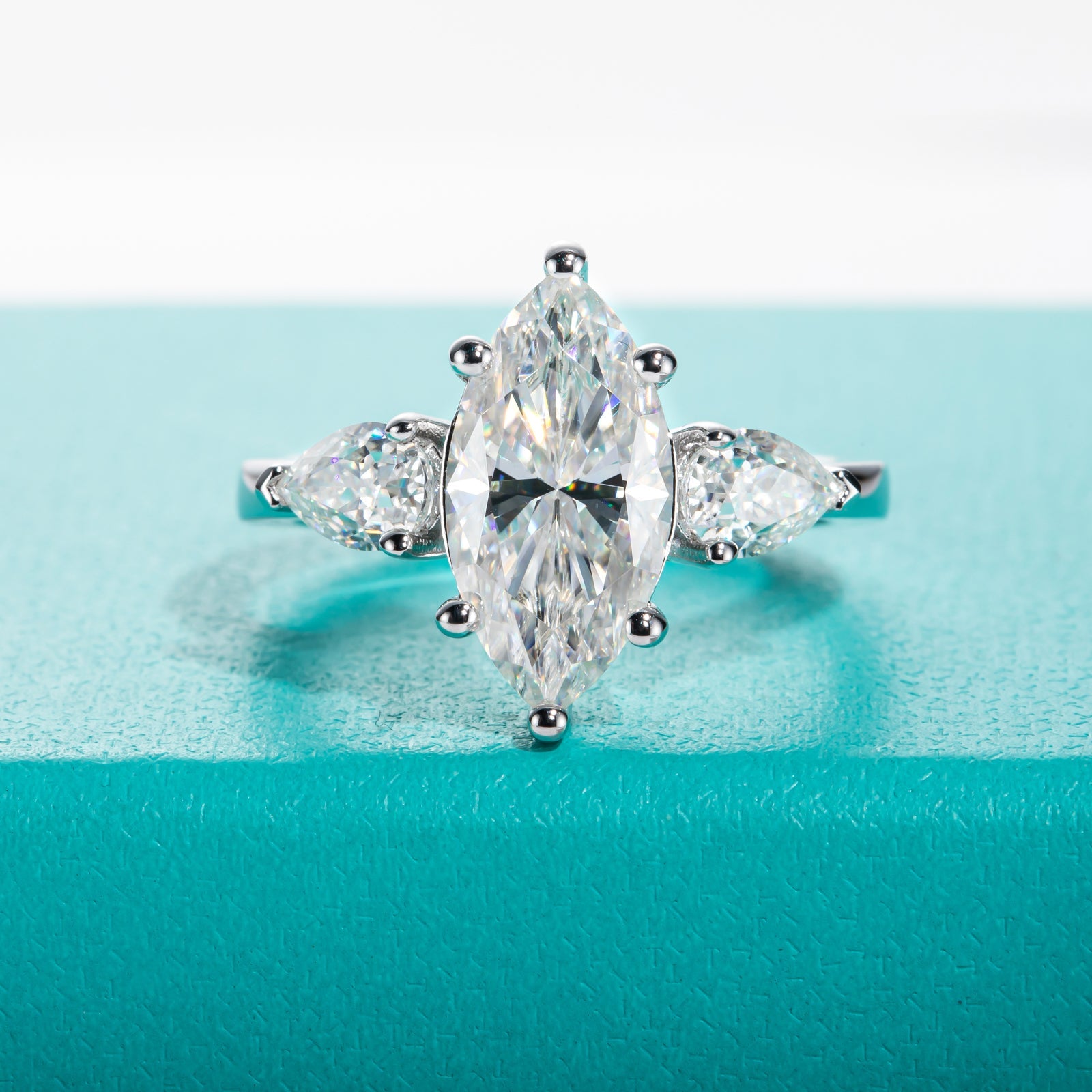 Marquise Cut 3 Stone Moissanite Engagement Ring (4 cttw)
