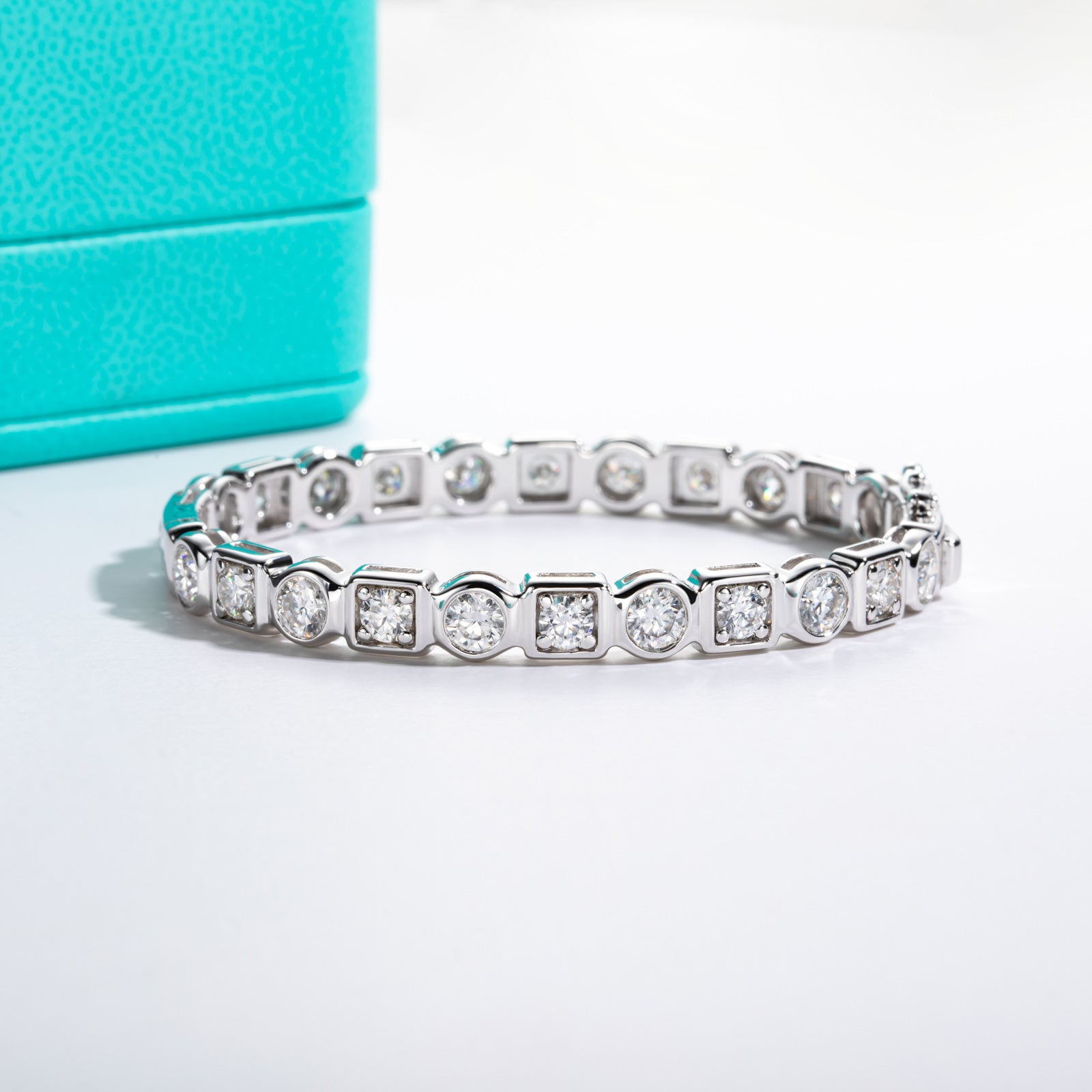 Round Cut Bezel Set Moissanite Tennis Bracelet (8.0-10.4 cttw)