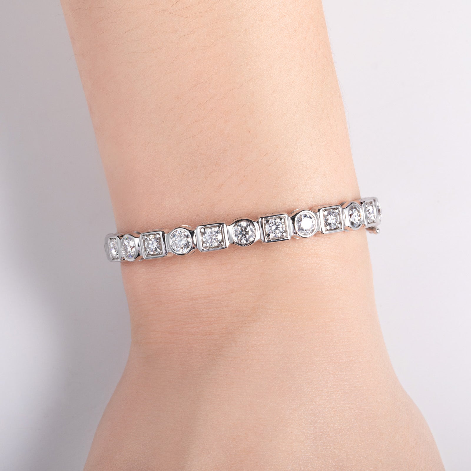 Round Cut Bezel Set Moissanite Tennis Bracelet (8.0-10.4 cttw)