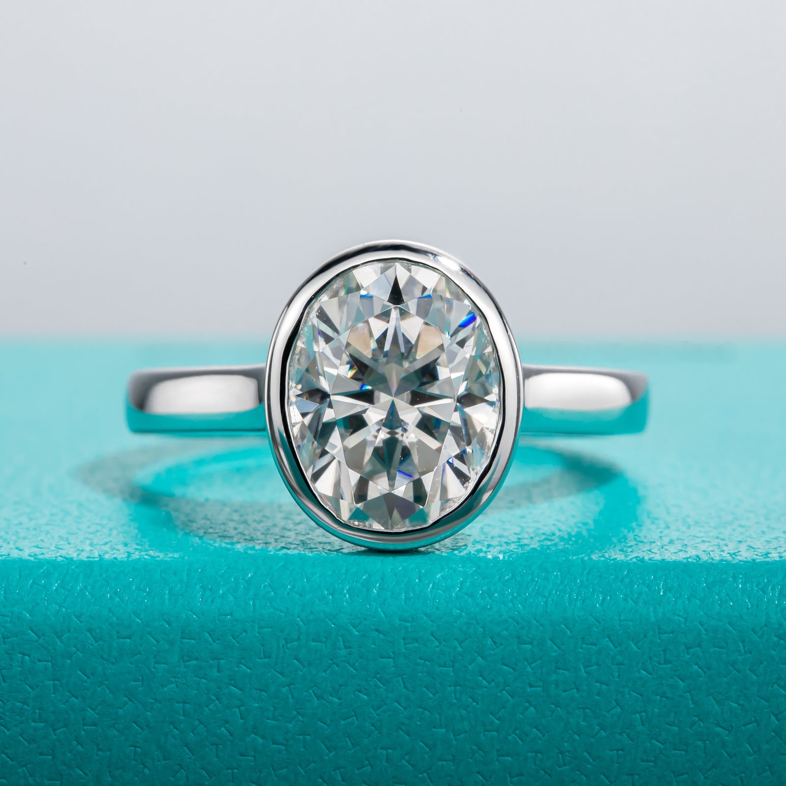 Oval Cut Bezel Moissanite Engagement Ring (3 ct)