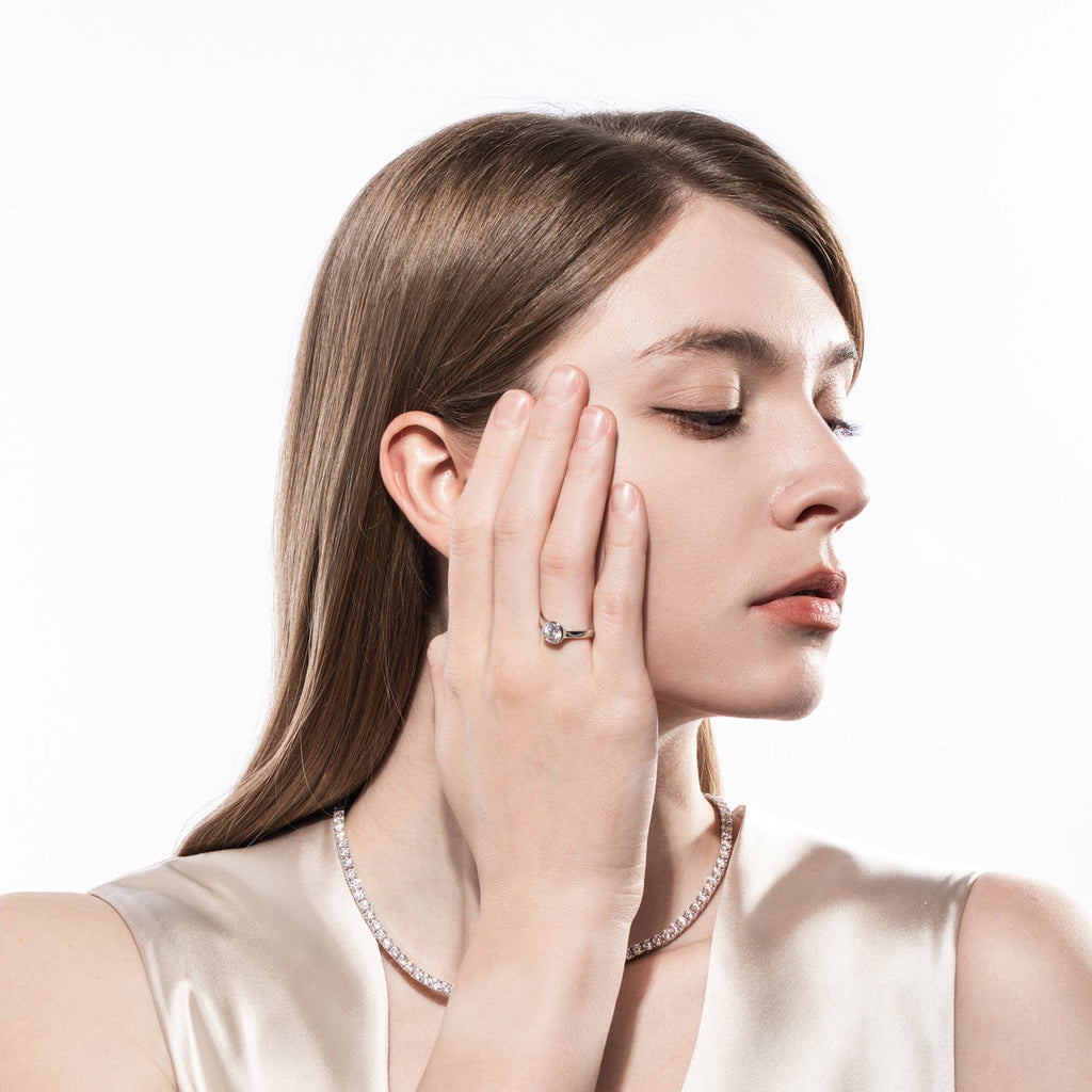 Round Cut Bezel Moissanite Engagement Ring (1 ct)